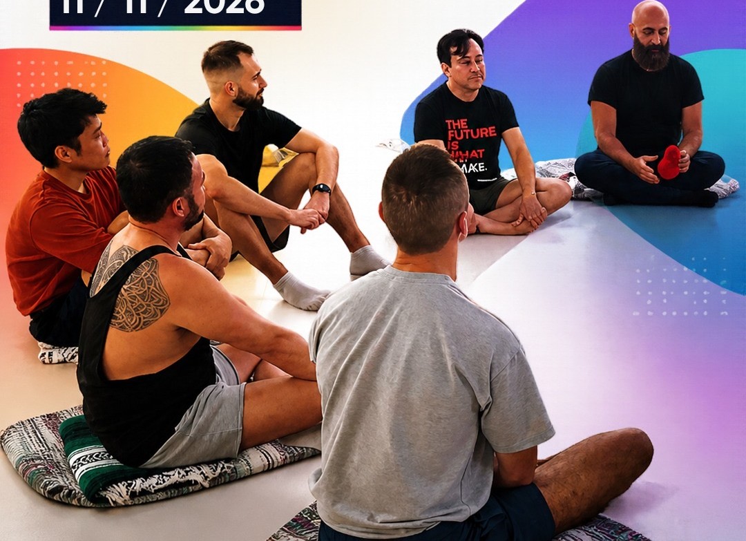 Queer men sitting together in a community gathering